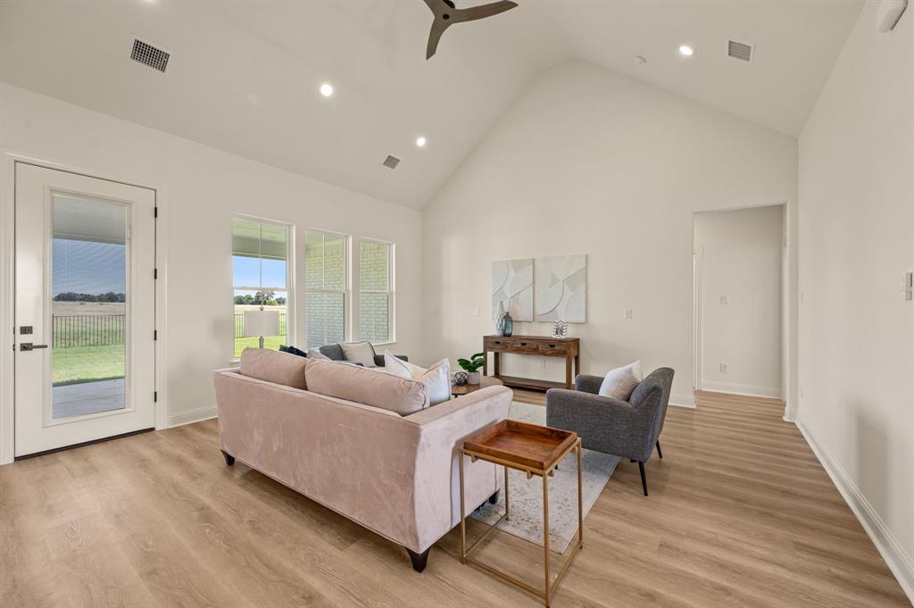 2705 Gospel Road Tolar, TX 76476 - Photo 9 of 36 Vaulted ceiling with recessed lighting and a ceiling fan