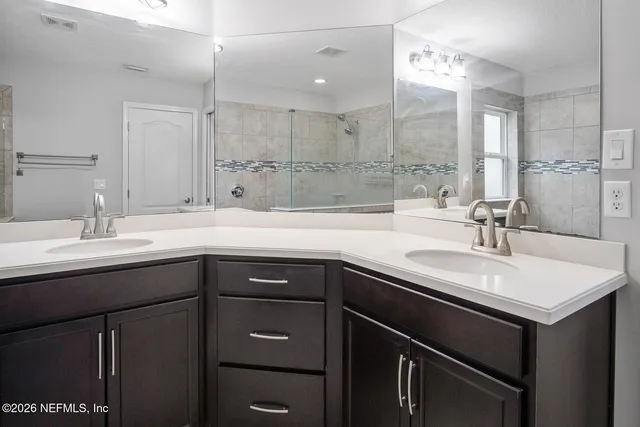 a sink with a cabinets and a sink