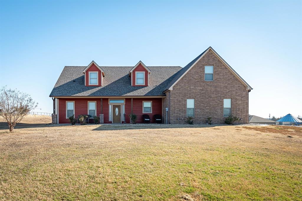 3028 Harrell Road Howe, TX 75459 - Photo 1 of 39 a front view of a house with a yard