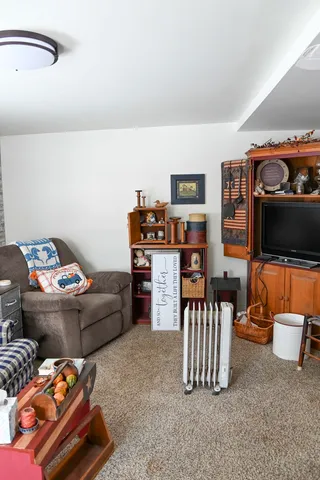 a room with furniture and a window