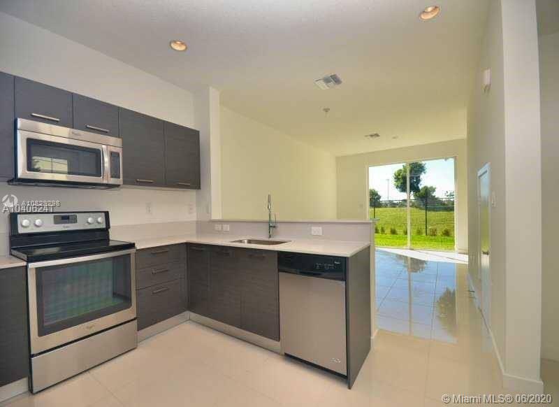 3404 Northwest 13th Street, Unit 3404 Lauderhill, FL 33311 - Photo 1 of 13