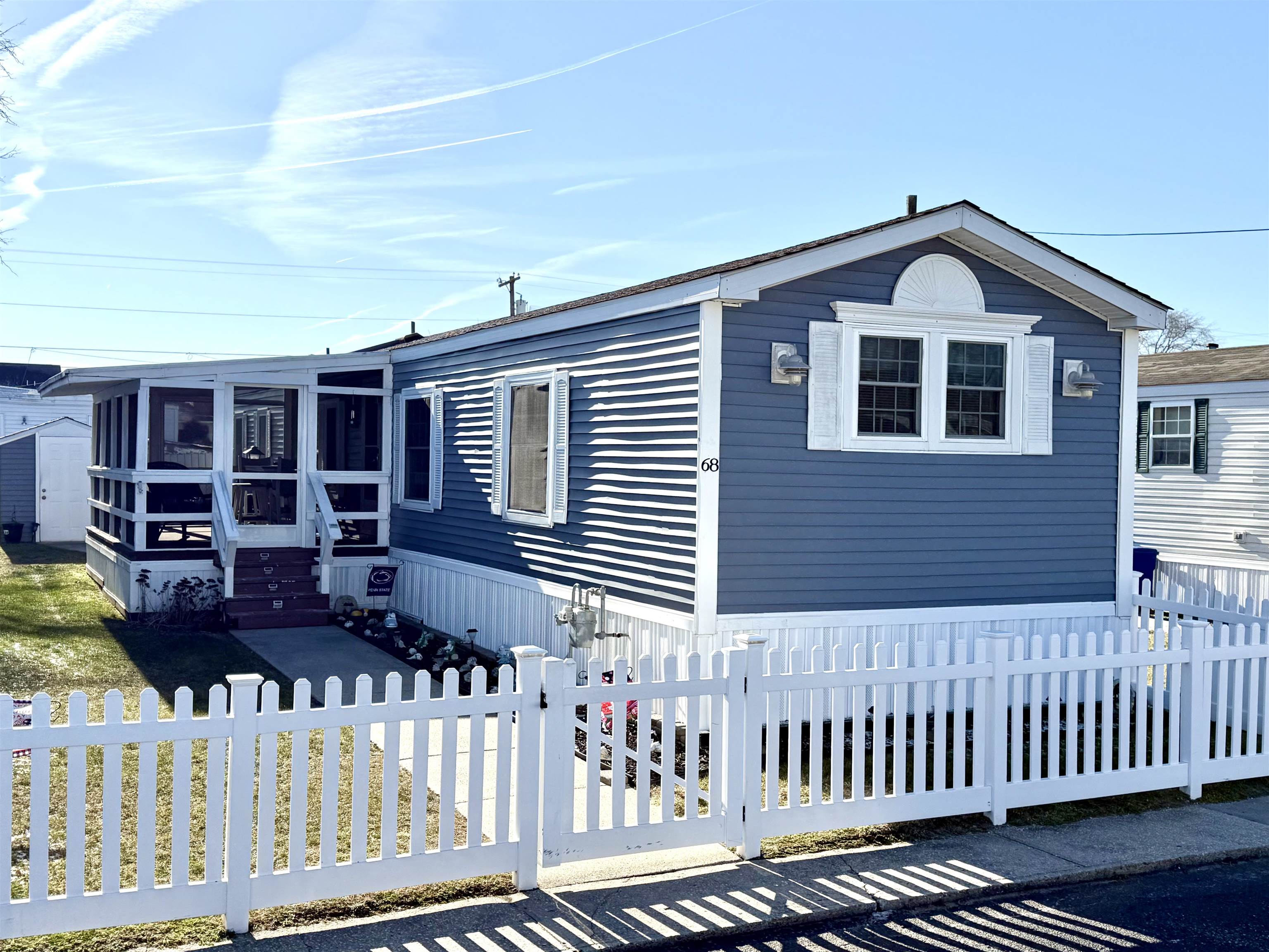 68 Priest Boulevard Rio Grande, NJ 08242 - Photo 1 of 28 a view of a house with wooden fence
