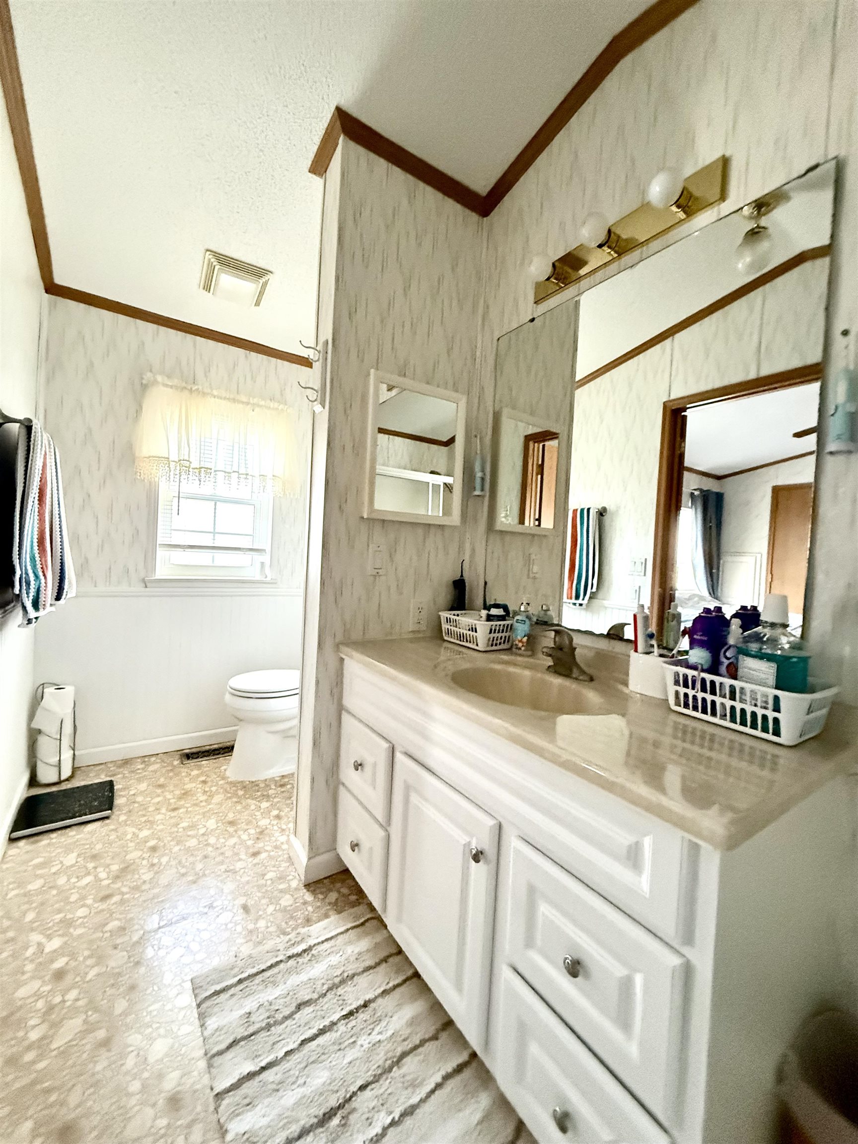 68 Priest Boulevard Rio Grande, NJ 08242 - Photo 14 of 28 a spacious bathroom with a granite countertop sink mirror and a