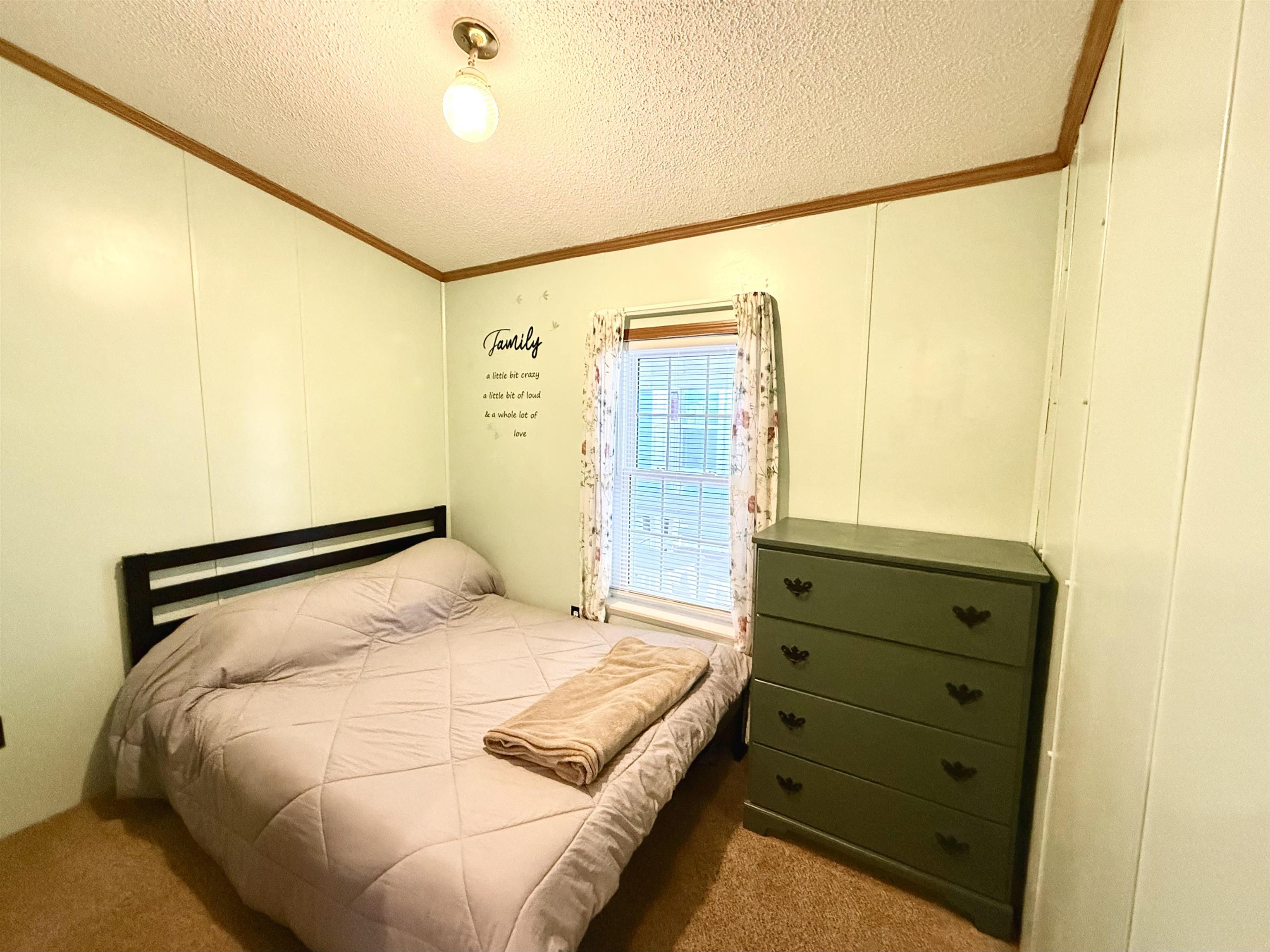 68 Priest Boulevard Rio Grande, NJ 08242 - Photo 15 of 28 a bedroom with a bed and a window