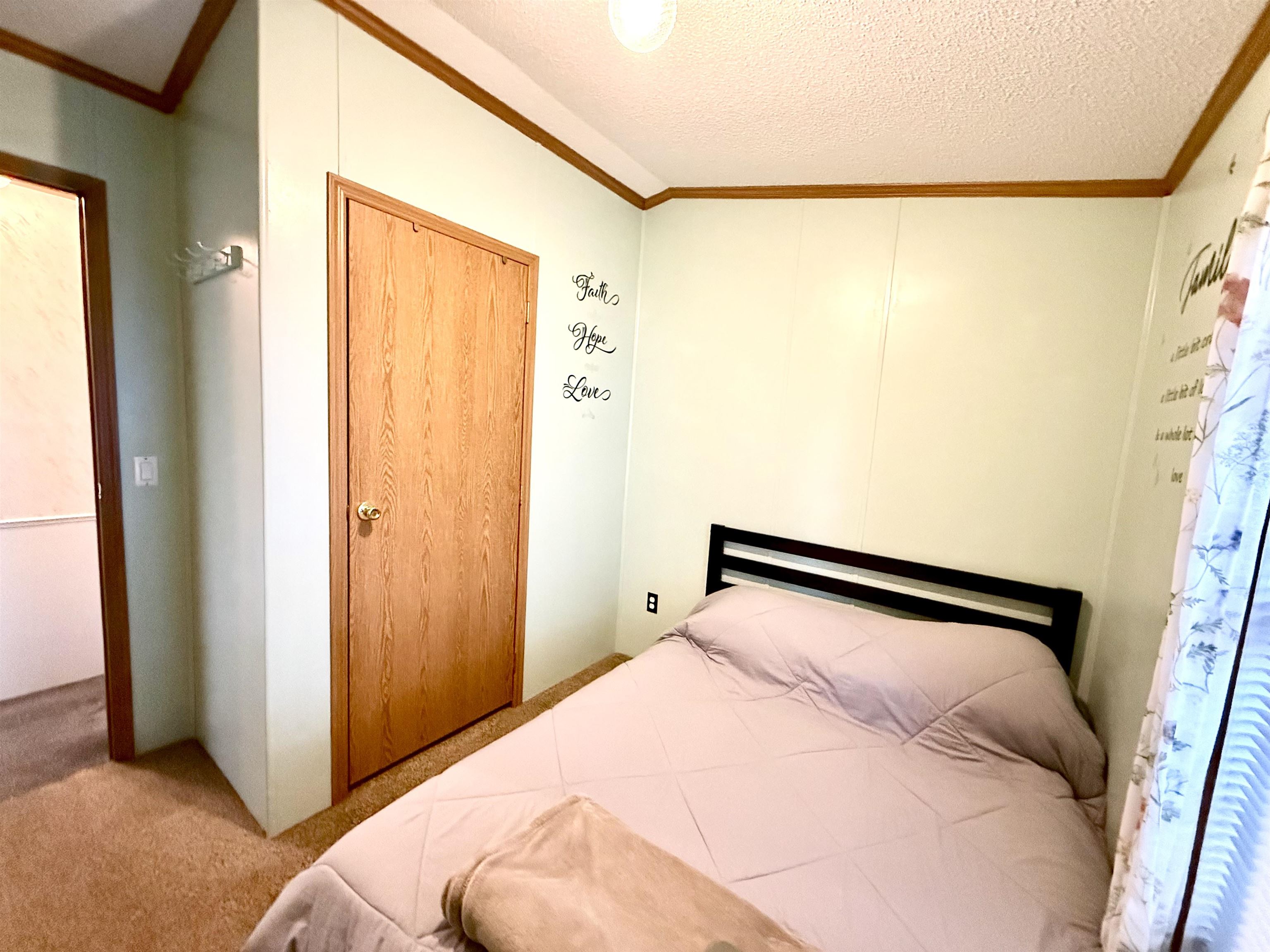 68 Priest Boulevard Rio Grande, NJ 08242 - Photo 16 of 28 a bedroom with a bed and a window