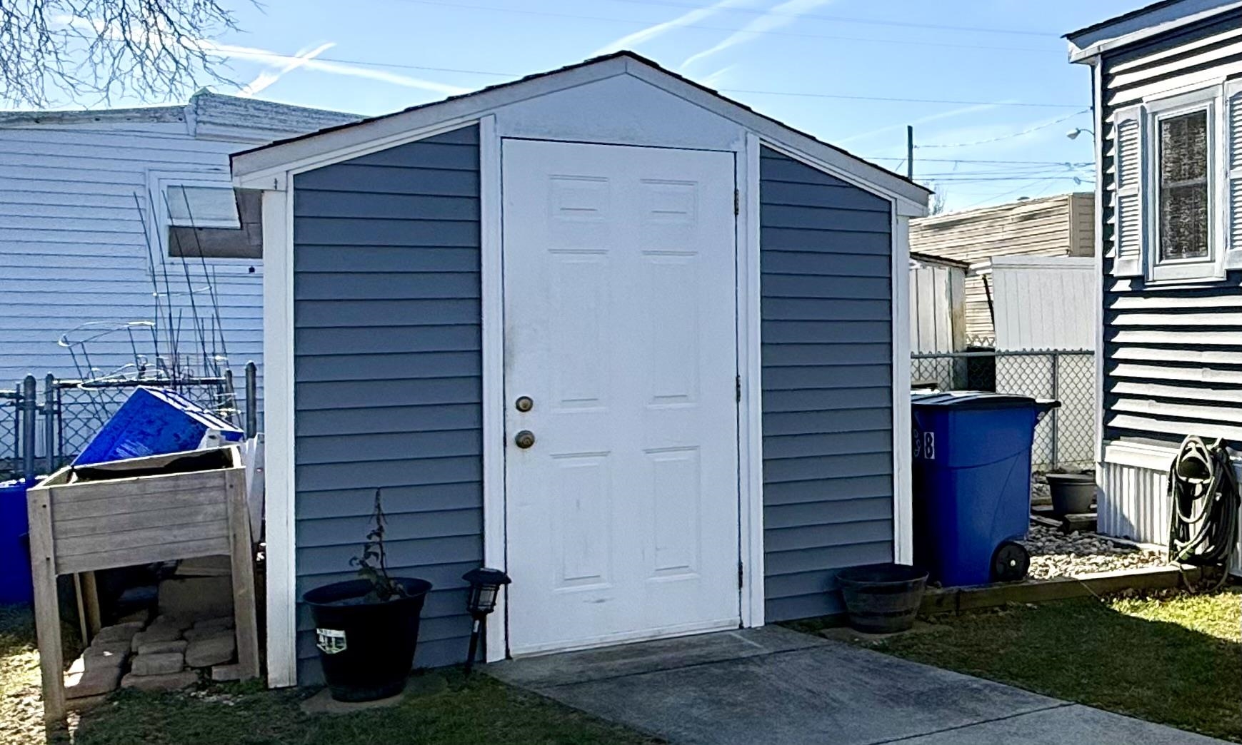 68 Priest Boulevard Rio Grande, NJ 08242 - Photo 22 of 28 a front view of a house with garden