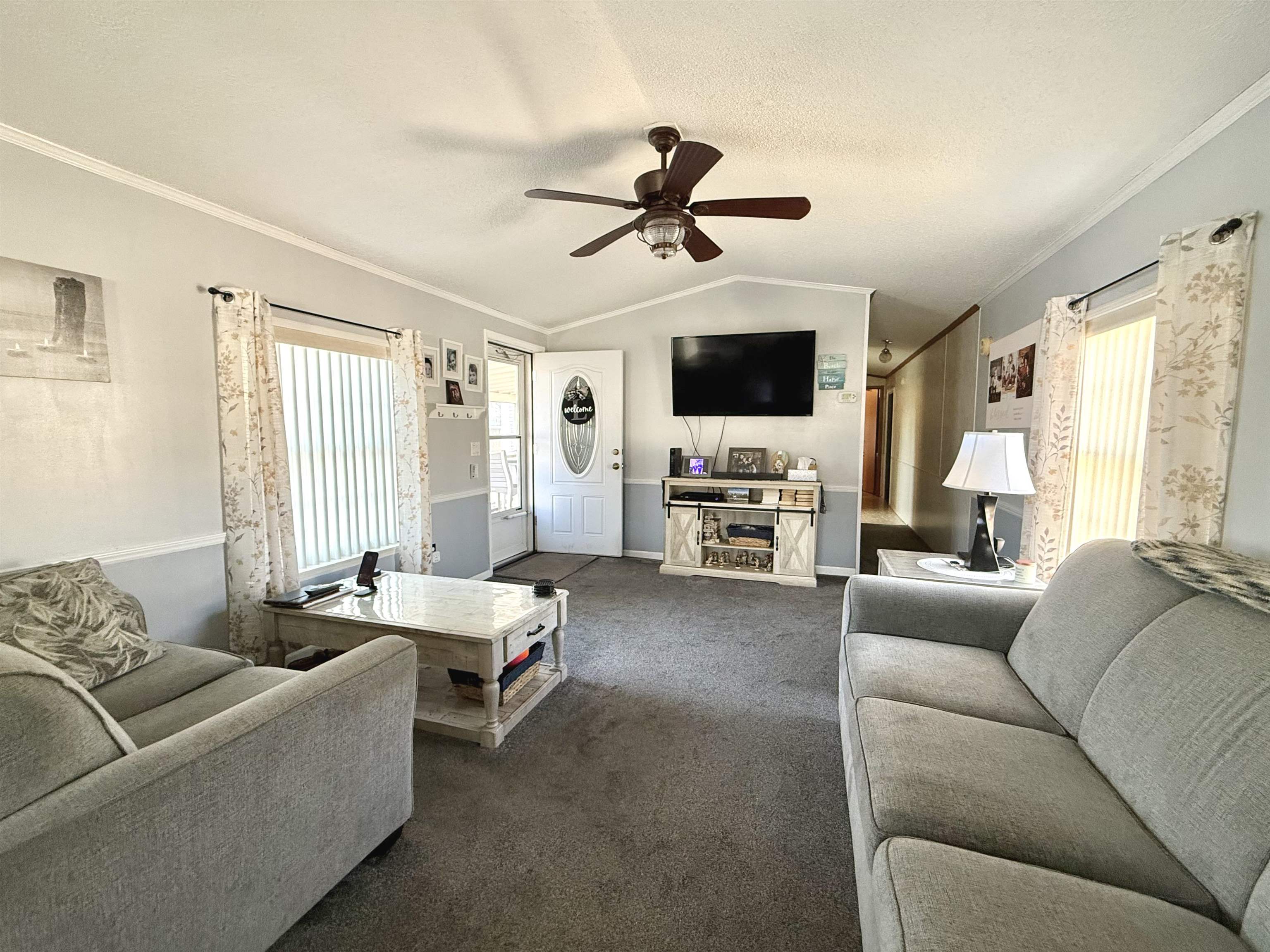 68 Priest Boulevard Rio Grande, NJ 08242 - Photo 6 of 28 a living room with furniture and a flat screen tv