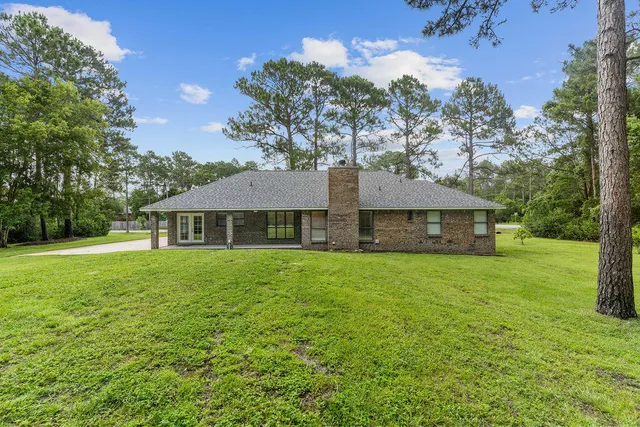 a house view with a garden space