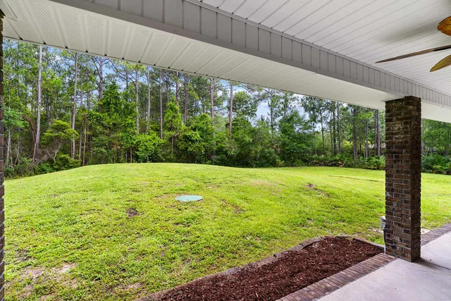 a view of a backyard with garden