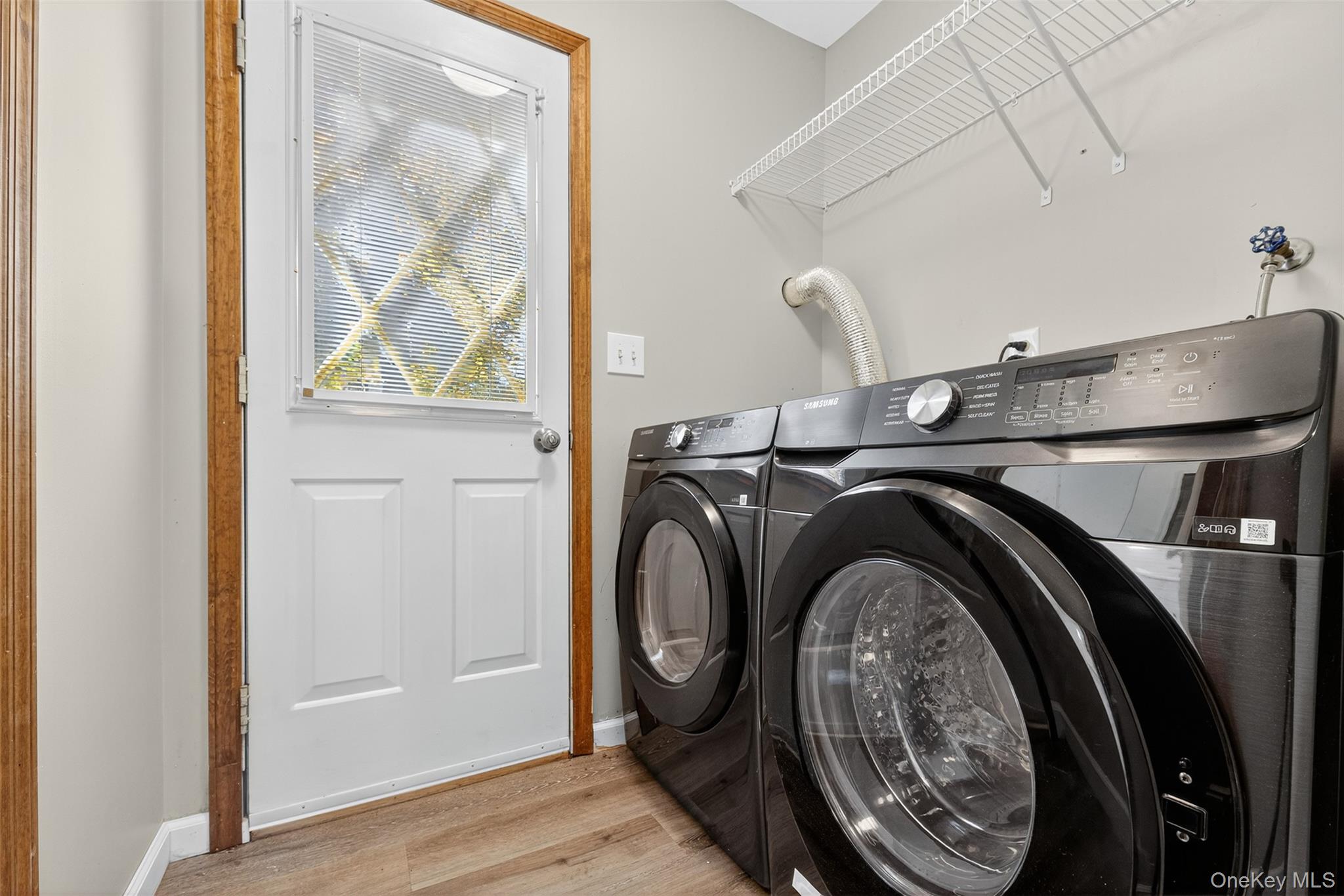13 Farmstead Road New Windsor, NY 12553 - Photo 14 of 27 a utility room with dryer and washer