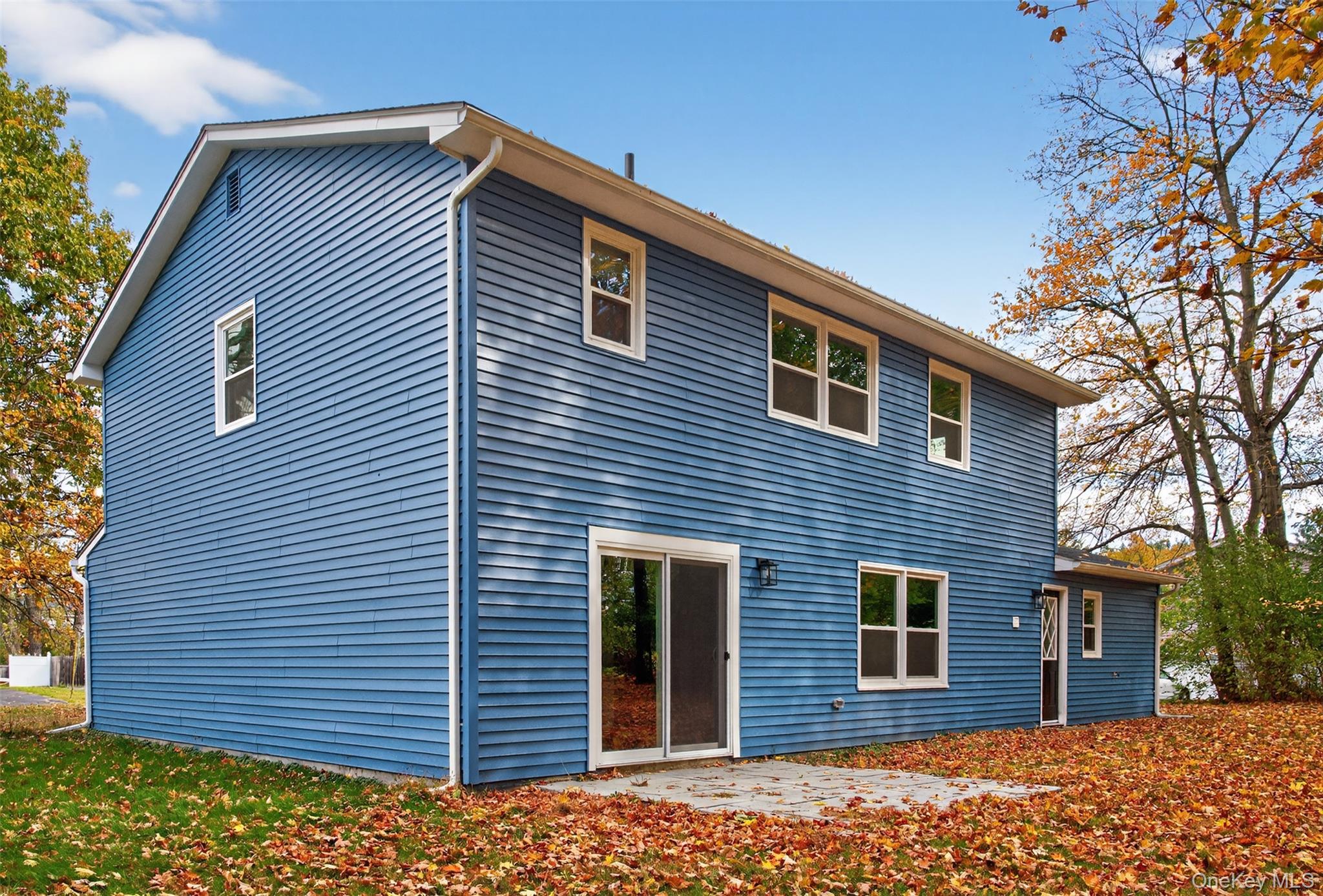 13 Farmstead Road New Windsor, NY 12553 - Photo 25 of 27 a front view of a house with a yard