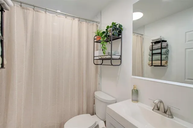 a view of an chairs and table in the patio