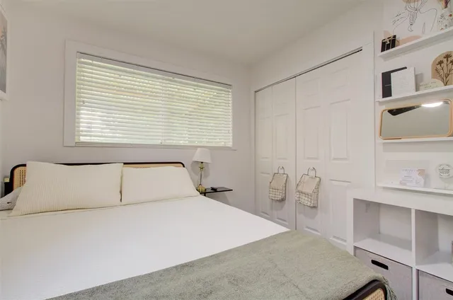 a front view of house with yard and outdoor seating