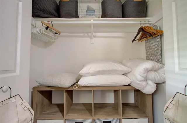 a view of a house with backyard porch and garden