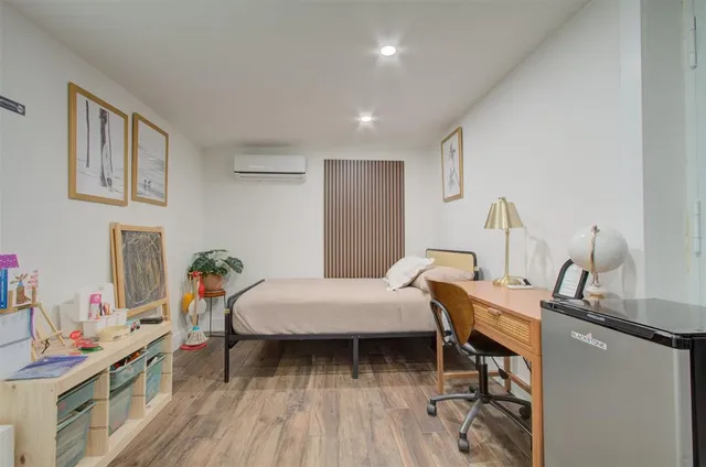 a view of a backyard with a plants and trees