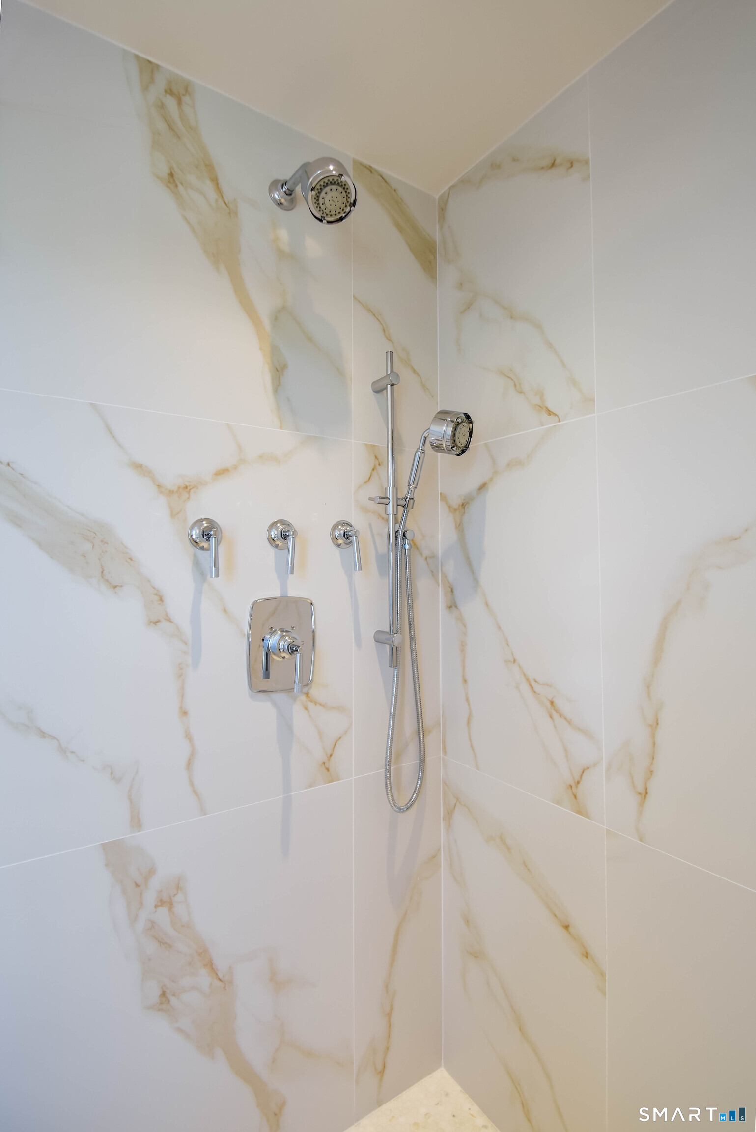 116 Sherman Street, Unit 2 Fairfield, CT 06824 - Photo 21 of 31 a bathroom with a shower