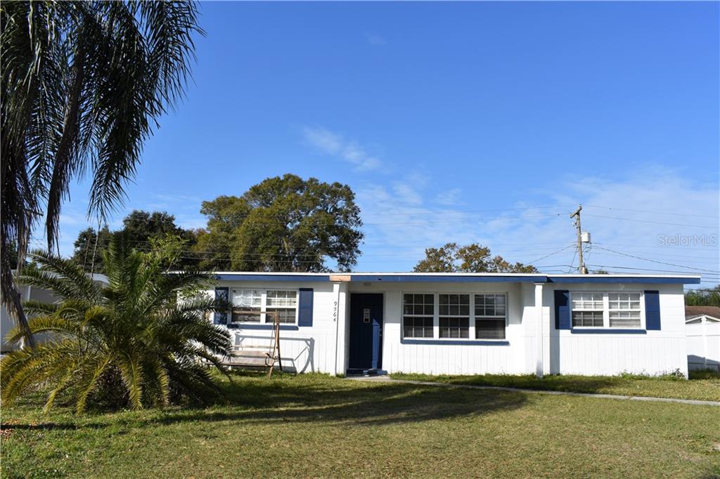 9564 Crestview Street Seminole, FL 33772 - Photo 1 of 1 a front view of a house with a yard