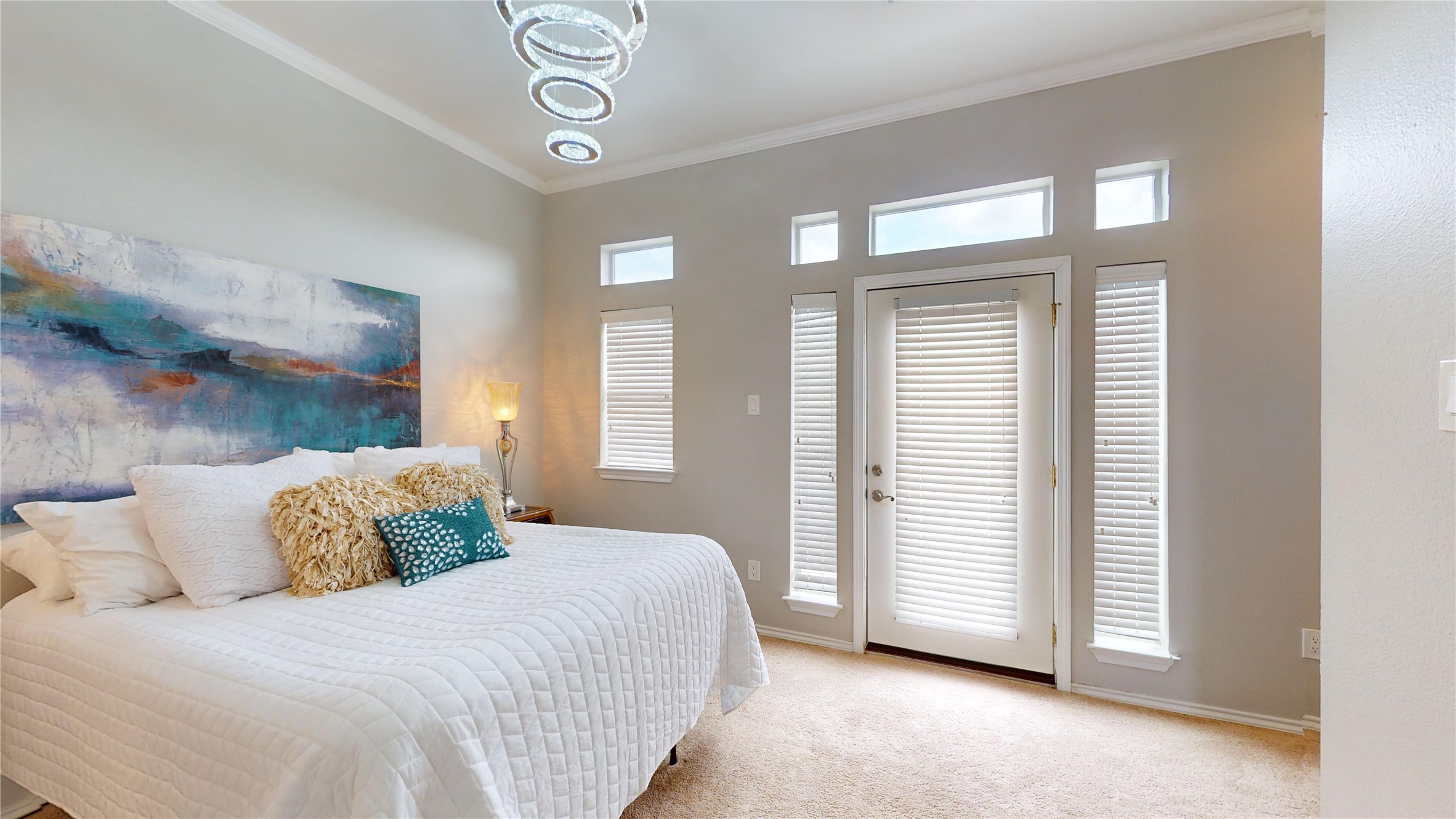 2918 Ranch Road 620, Unit 297 Austin, TX 78734 - Photo 9 of 37 Bedroom featuring light colored carpet, ornamental molding, and access to outside