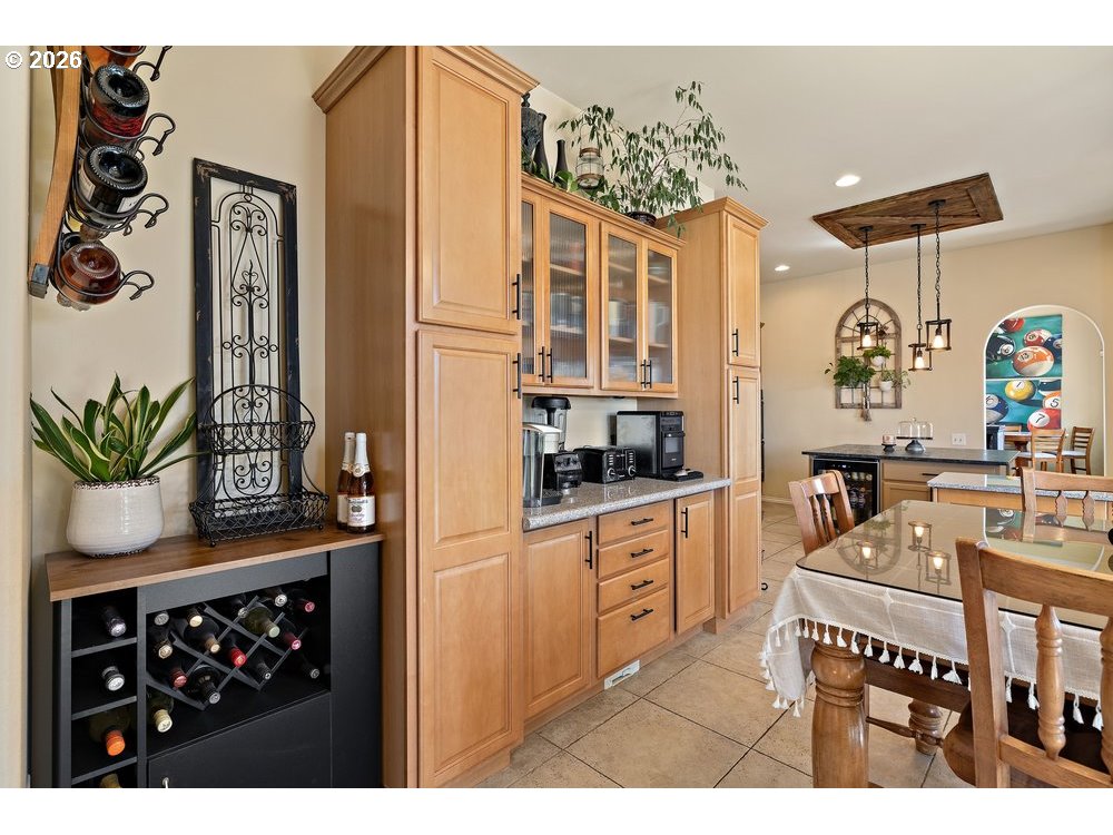500 St Hilaire Road Yakima, WA 98901 - Photo 6 of 29 a kitchen with a refrigerator and a stove