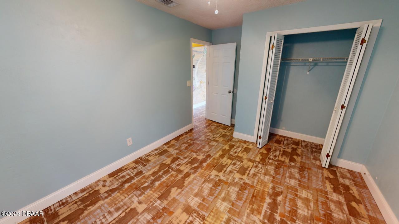 2219 Umbrella Tree Drive Edgewater, FL 32141 - Photo 15 of 22 2219-Umbrella-Tree-Drive-Bedroom 1