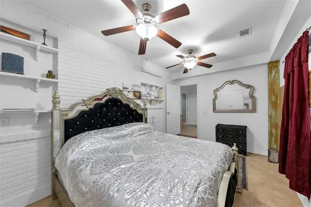 a bathroom with a shower and toilet