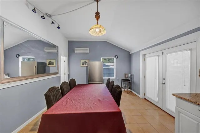 a room with furniture and a window