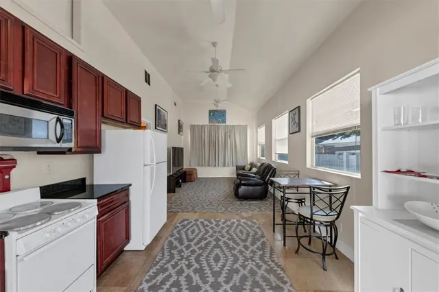 an aerial view of a house with a garden