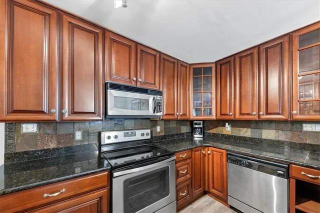 a view of living room with furniture and window