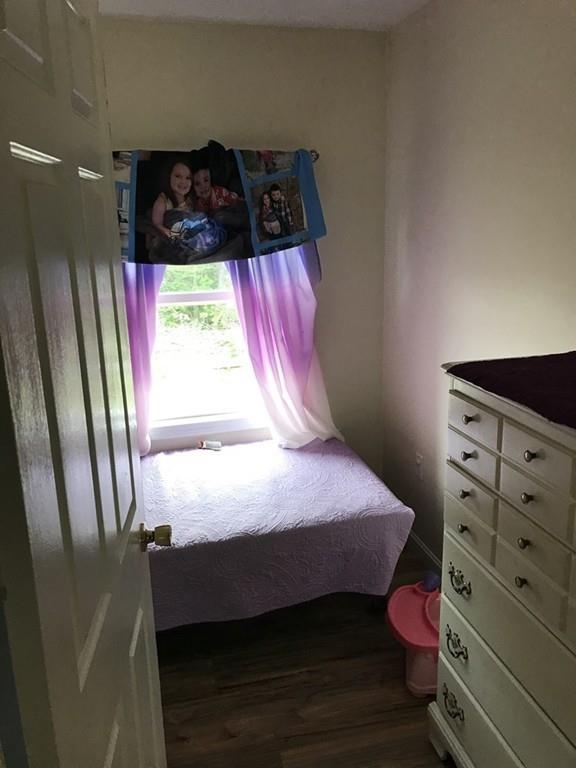 8 Dolbier Hill Road Templeton, MA 01468 - Photo 12 of 15 a bedroom with a bed next to a window