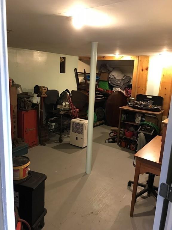 8 Dolbier Hill Road Templeton, MA 01468 - Photo 13 of 15 a room with gym equipment and a flat screen tv