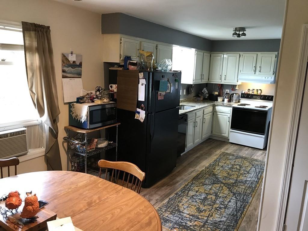 8 Dolbier Hill Road Templeton, MA 01468 - Photo 7 of 15 a kitchen with a sink refrigerator and microwave