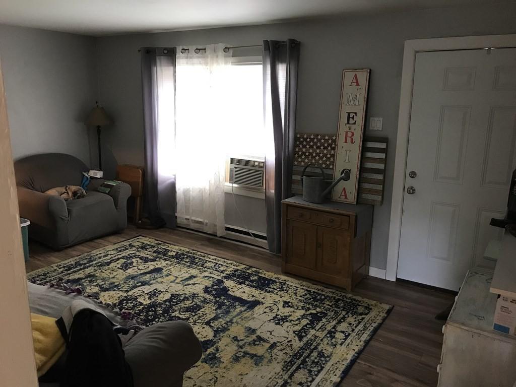 8 Dolbier Hill Road Templeton, MA 01468 - Photo 8 of 15 a bedroom with a bed and wooden floor