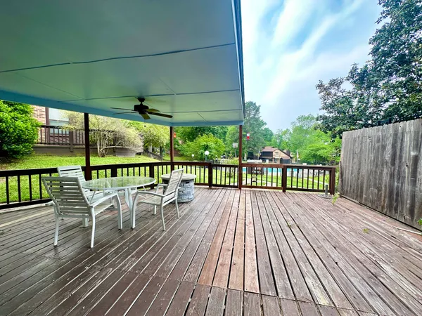 a view of a chairs on the roof deck
