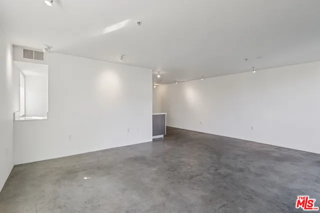 an empty room with an entryway