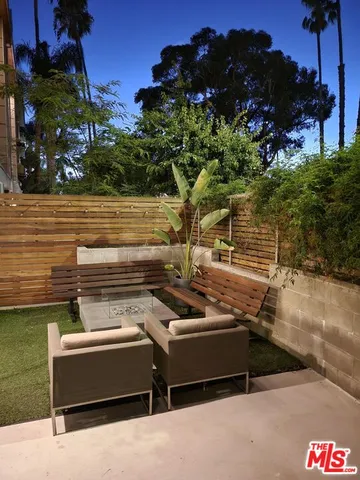 a view of a terrace with outdoor seating