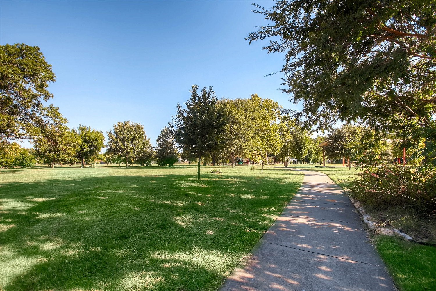 6002 Camino Real Austin, TX 78757 - Photo 13 of 26 a big yard with lots of green space