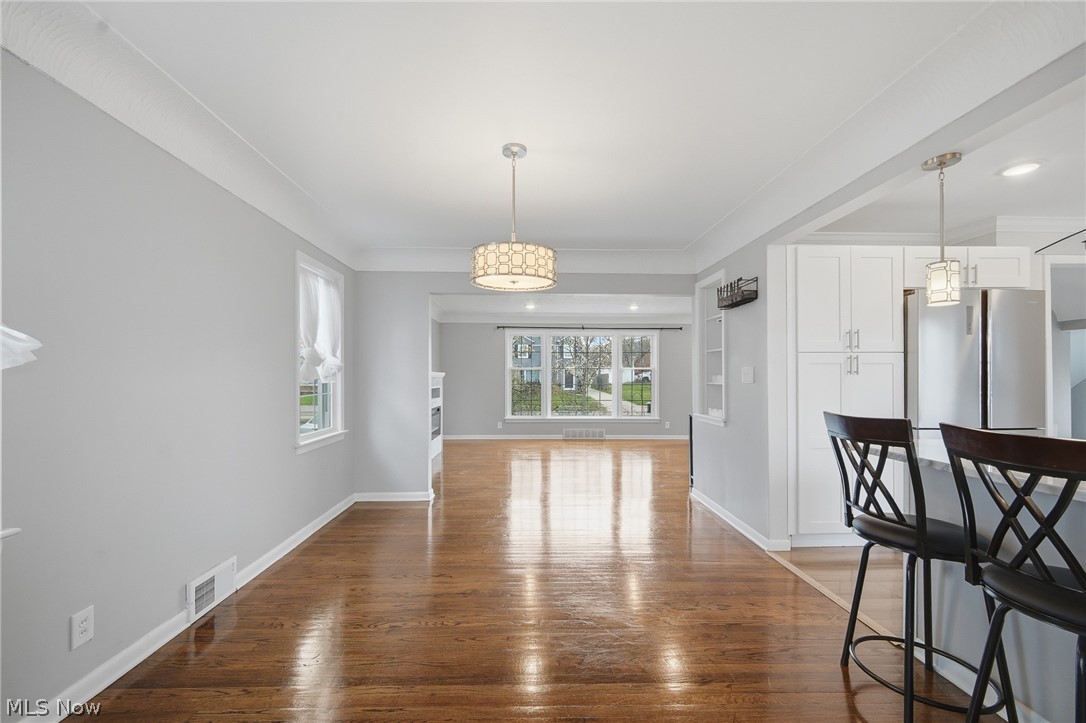 3722 Lindholm Road Shaker Heights, OH 44120 - Photo 12 of 34 This inviting living space features hardwood floors, light gray walls, and white trim