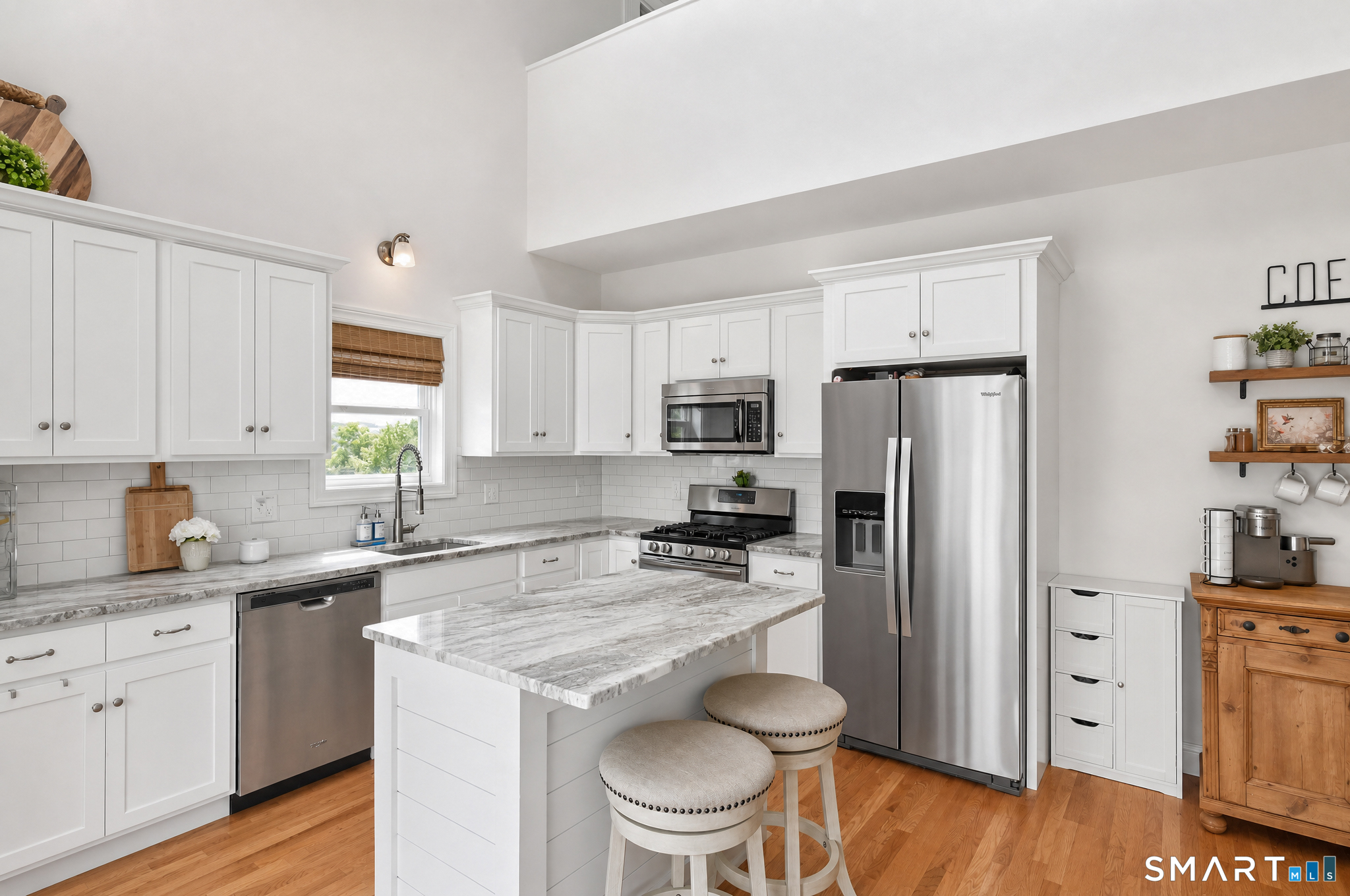 43 George Street, Unit 1 Seymour, CT 06483 - Photo 10 of 33 Stainless steel appliances and center island with built in wine fridge.