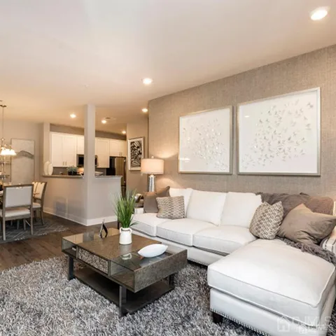 a living room with furniture and a table