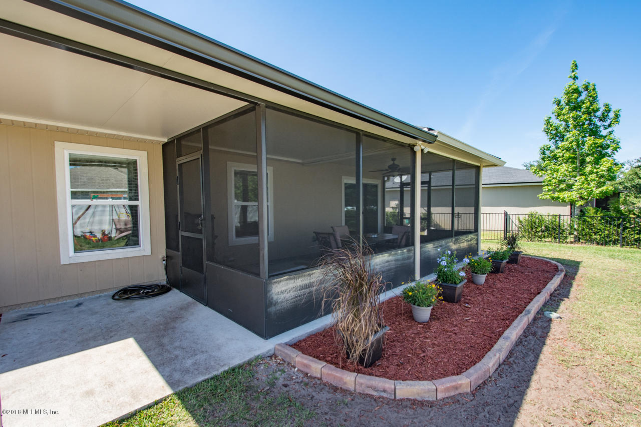 26 North Twin Maple Road St. Augustine, FL 32084 - Photo 23 of 26 a view of a porch