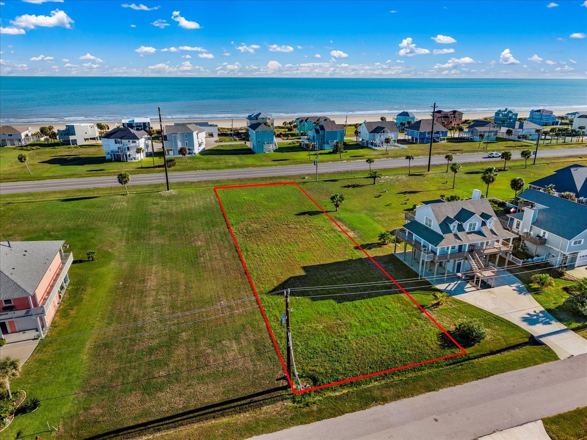 18703 Shaman Road Galveston, TX 77554 - Photo 2 of 20 a view of a tennis court