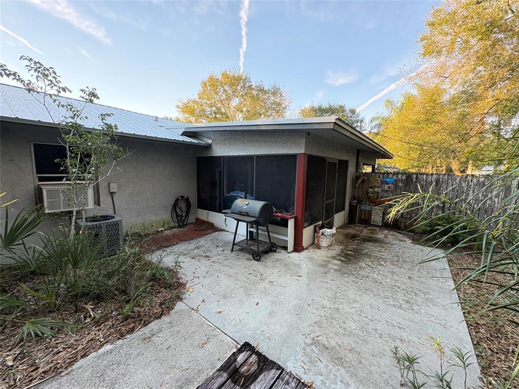 540 Northwest 24th Avenue Okeechobee, FL 34972 - Photo 22 of 24 a view of a two chair in the patio