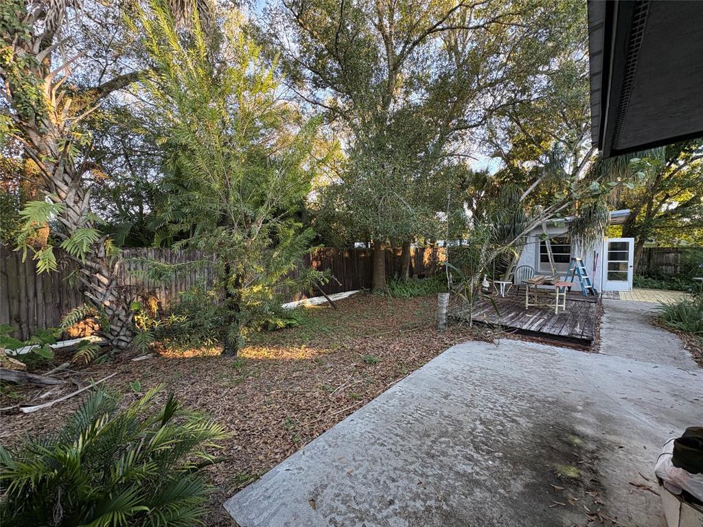 540 Northwest 24th Avenue Okeechobee, FL 34972 - Photo 23 of 24 a view of a house with truck parked in a yard