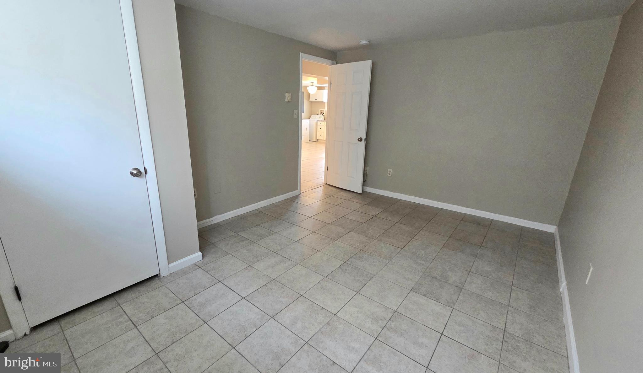 4400 4th Street Baltimore, MD 21225 - Photo 14 of 25 an empty room with windows