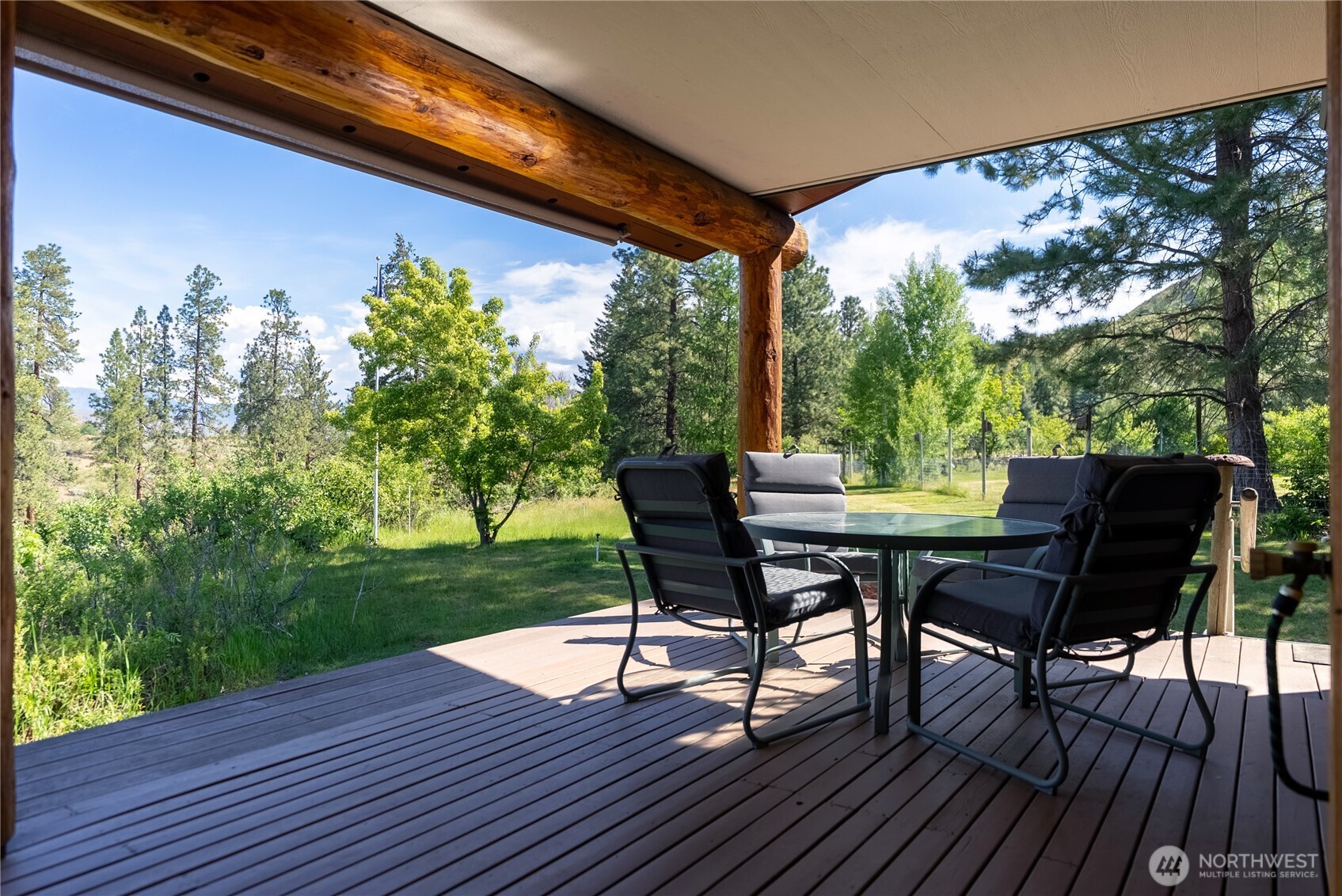 2621 Highway 153 Twisp, WA 98856 - Photo 35 of 40 a view of a chairs and table in the deck