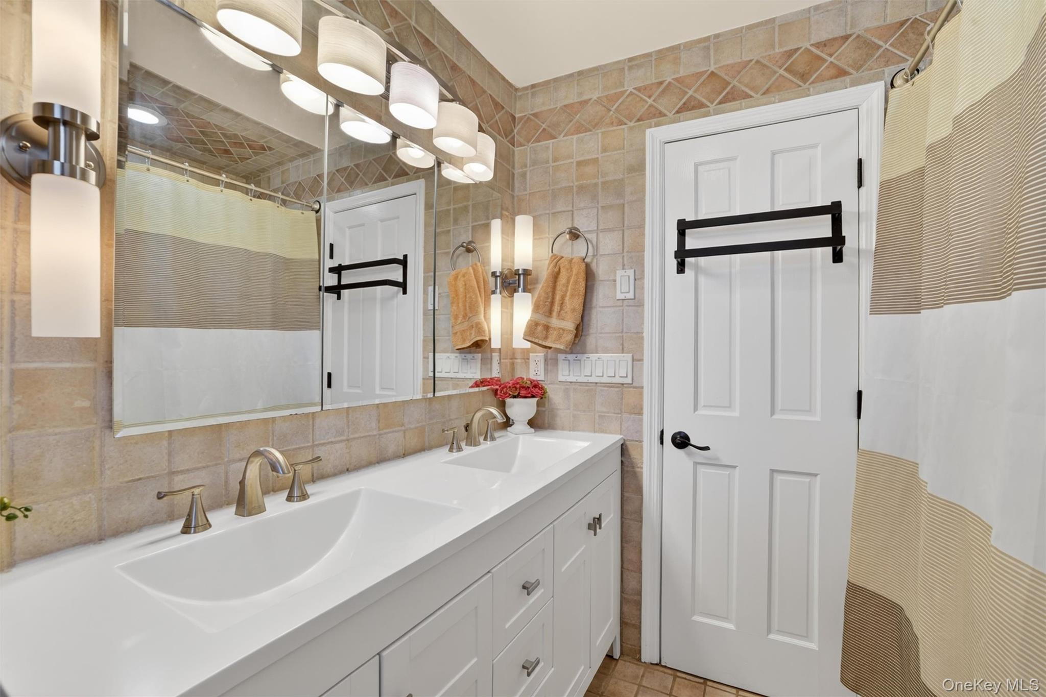 9 Ridge Road Cortlandt Manor, NY 10567 - Photo 28 of 47 Oversized double sink vanity and upscale lighting