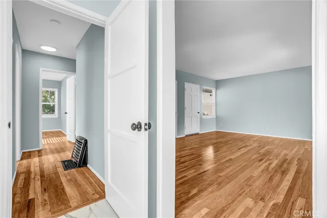 a view of a bedroom from the hallway