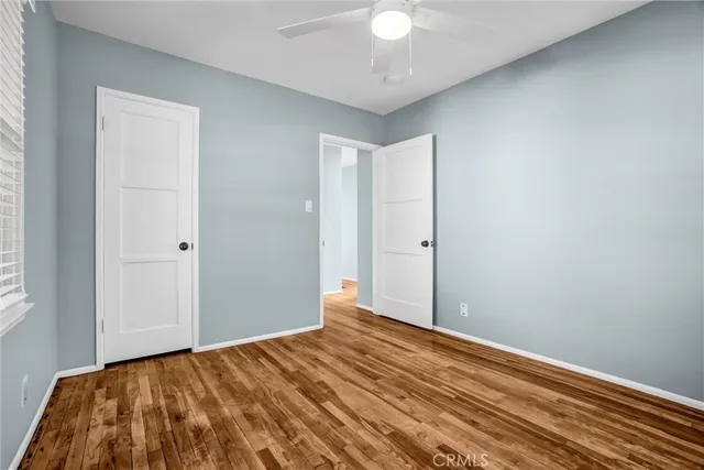 a view of a livingroom with wooden floor