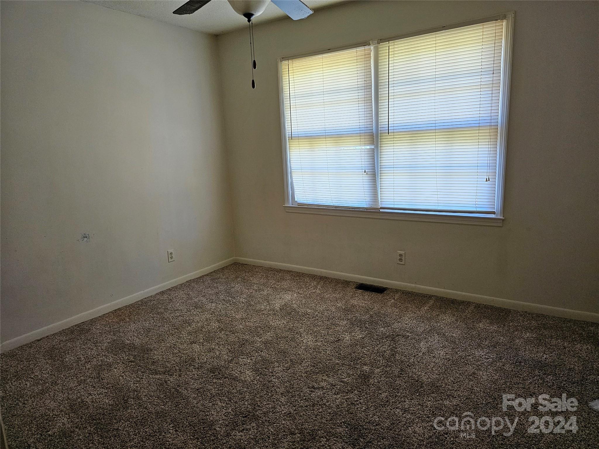 2702 University Drive Lancaster, SC 29720 - Photo 13 of 17 an empty room with a window