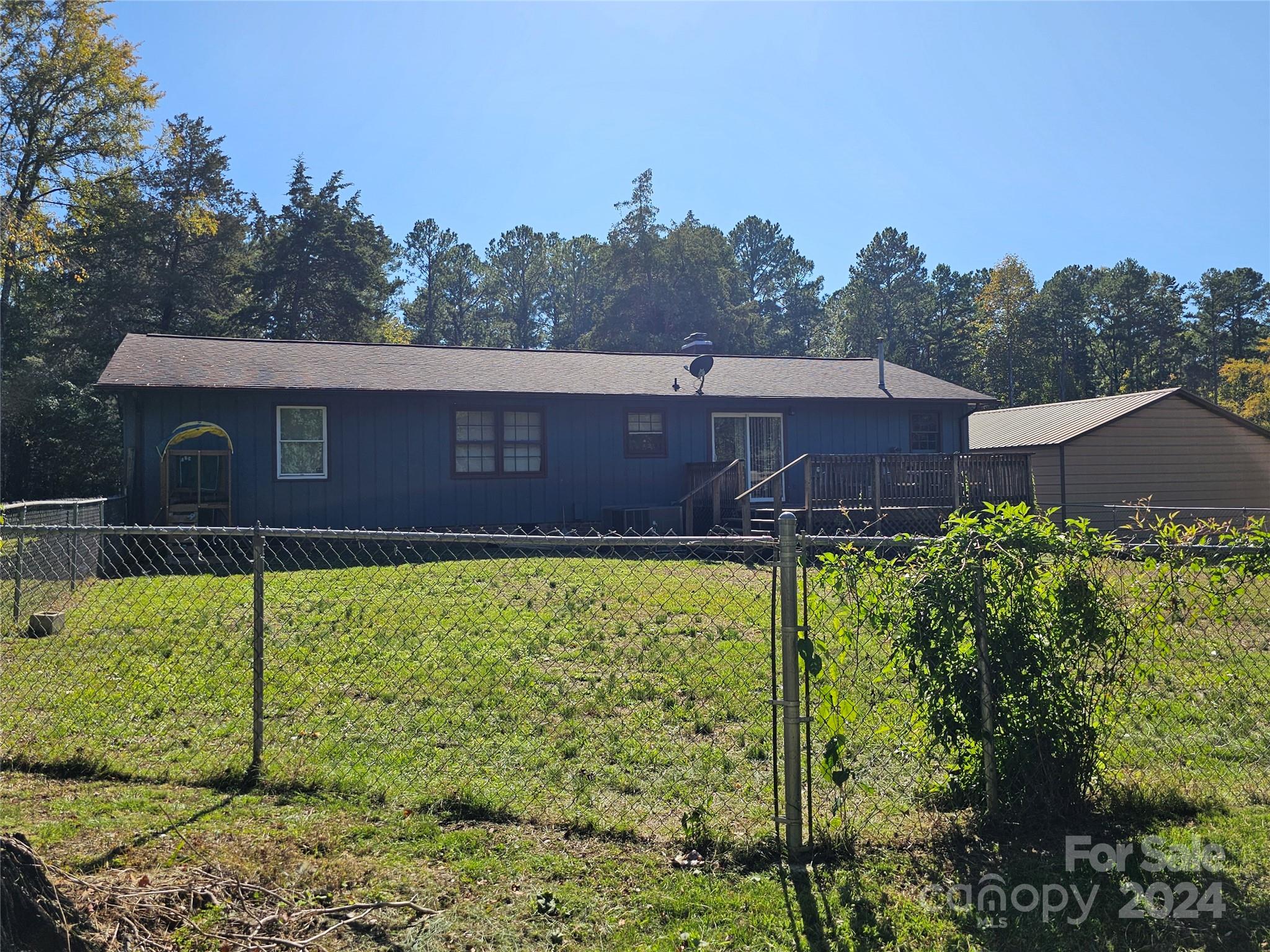2702 University Drive Lancaster, SC 29720 - Photo 3 of 17 a view of a house with a yard